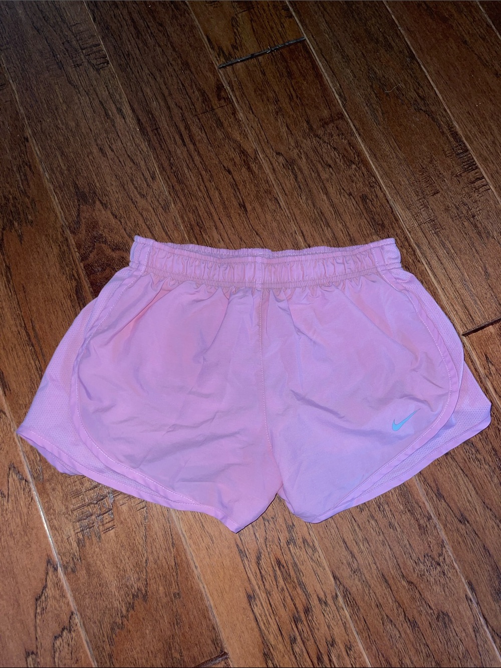 Nike Light Pink Athletic Running Shorts with Teal Swoosh